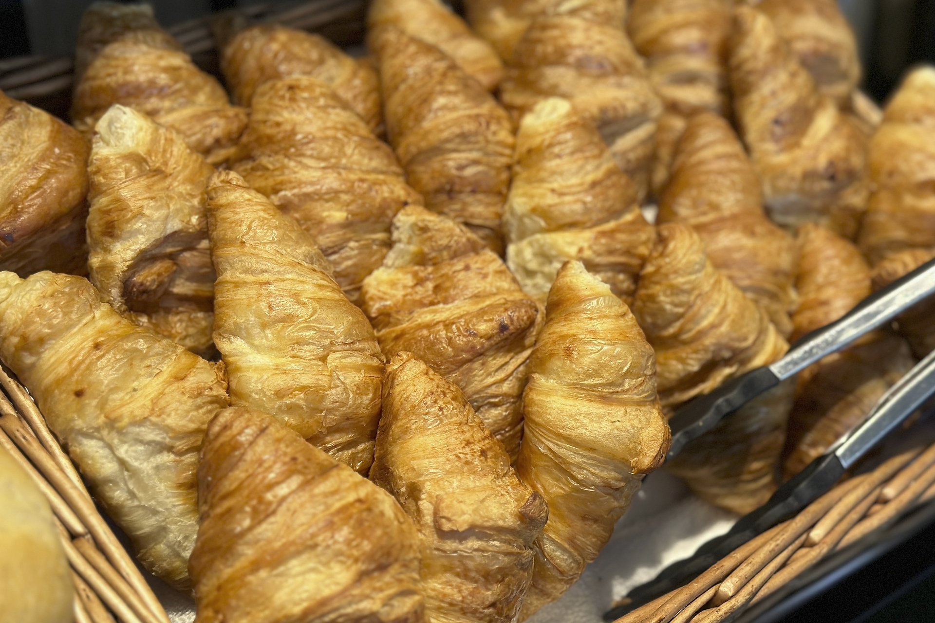 Our hotel at the exhibition centre: the picture gallery Basket filled with fresh, golden croissants